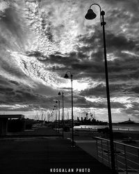 Road against cloudy sky