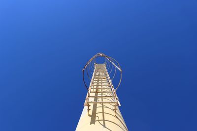 Low angle view of built structure against blue sky