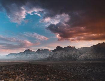 Scenic view of mountains against sky during sunset
