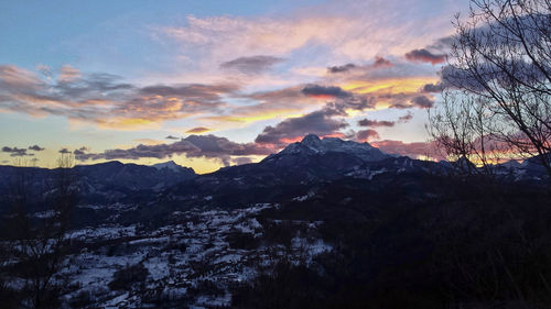 Scenic view of mountains at sunset