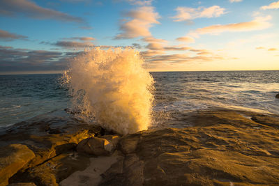 Scenic view of sea at sunset