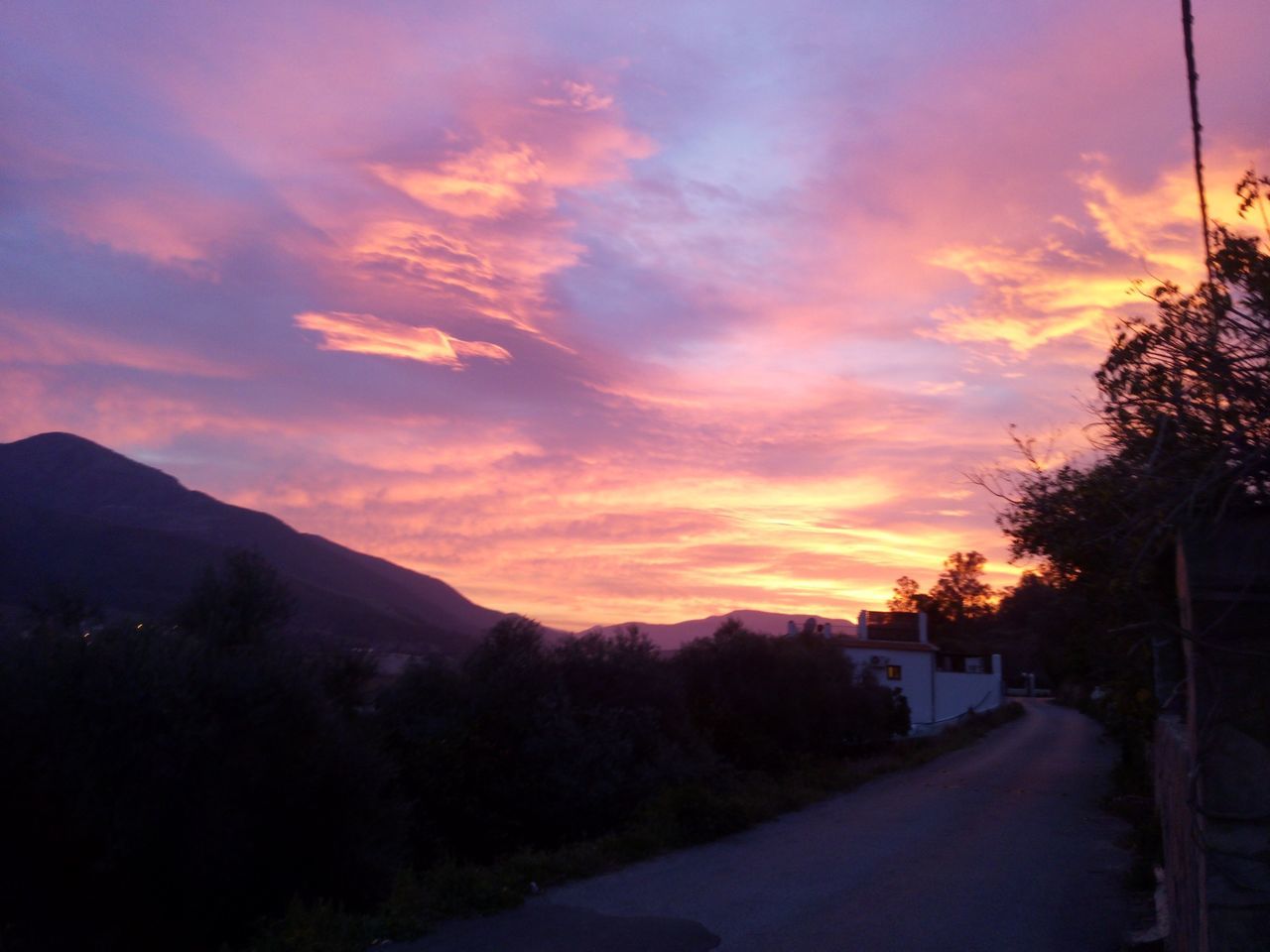 sunset, sky, silhouette, tree, road, scenics, tranquil scene, mountain, tranquility, beauty in nature, cloud - sky, orange color, nature, landscape, the way forward, transportation, cloud, dusk, idyllic, mountain range