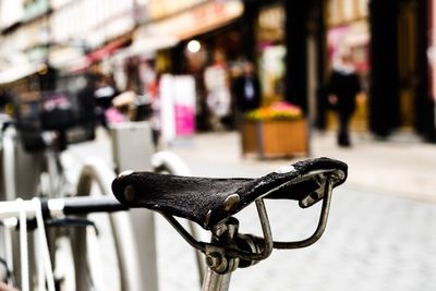 Close-up of bicycle on street