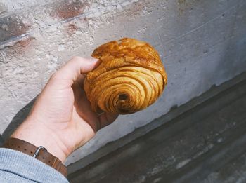 High angle view of person holding bread