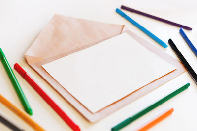 High angle view of colored pencils on table