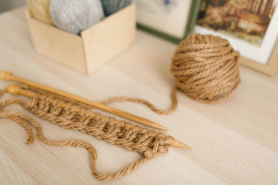 Close-up of woolen ball on table