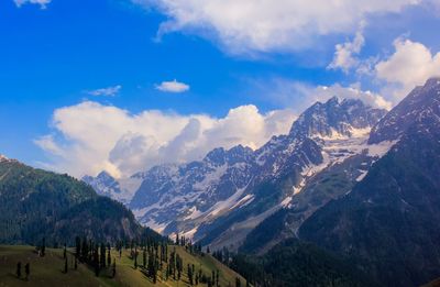 Scenic view of snowcapped mountains against sky