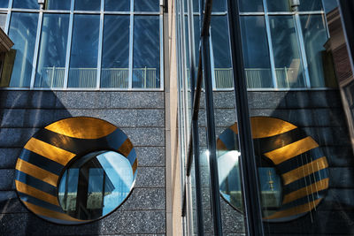 Reflection of building on window