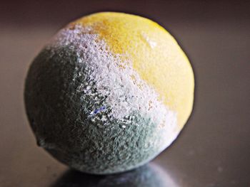 Close-up of lemon on table