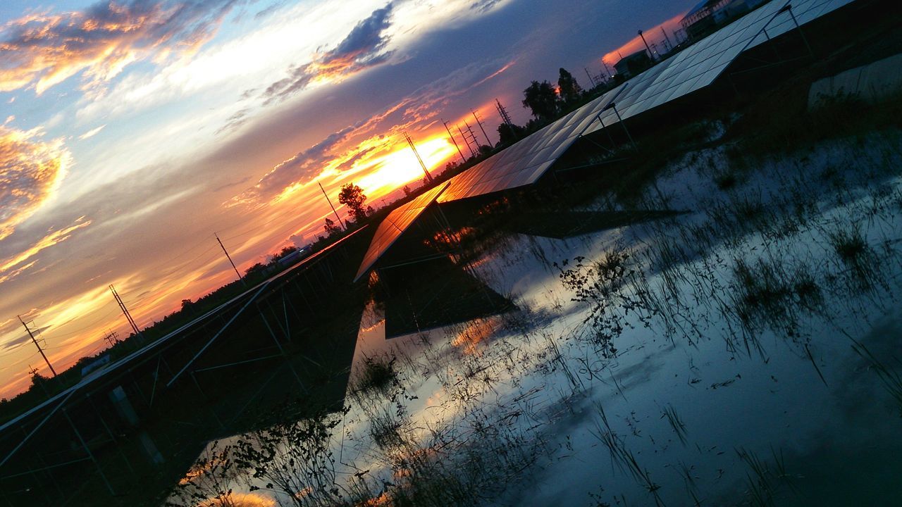 REFLECTION OF SKY ON SEA DURING SUNSET