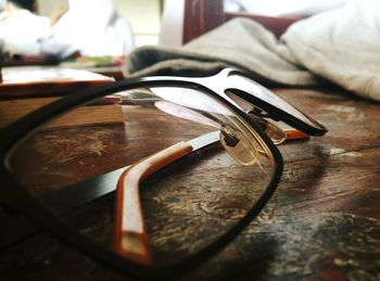 Close-up of eyeglasses on table