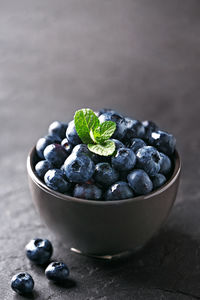 Close-up of fruits in bowl on table