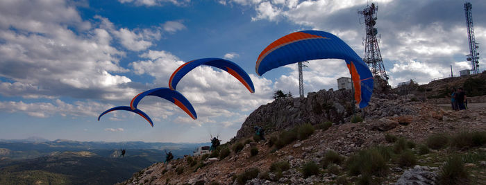 Low angle view of kite flying against sky