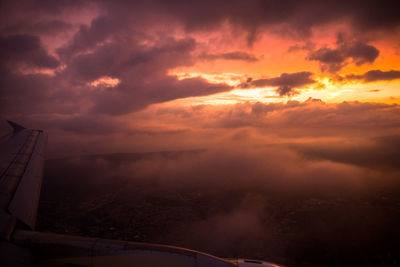 Scenic view of clouds over landscape against sky