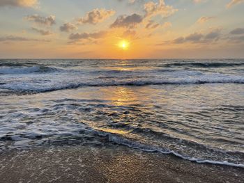 Scenic view of sea against sky during sunset