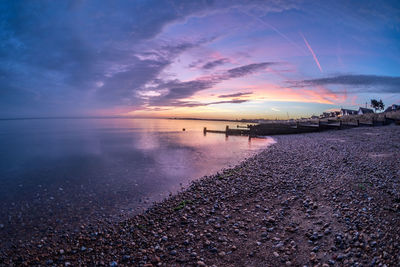 Scenic view of sea against sky during sunset