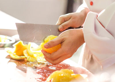 Close-up of person preparing food