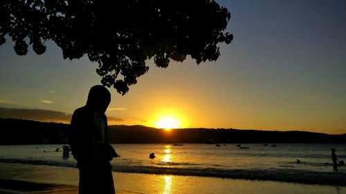 Silhouette of man at sunset