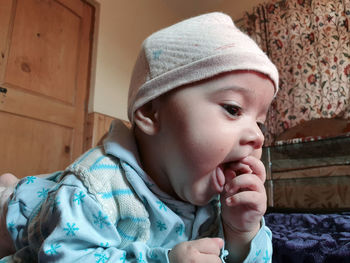 Portrait of cute boy wearing hat