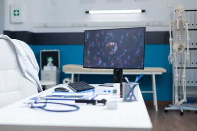 Midsection of man working in office