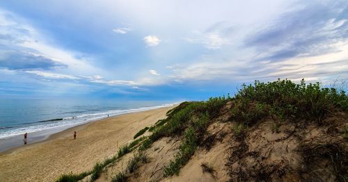 Scenic view of beach against sky