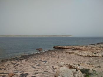 Scenic view of sea against clear sky