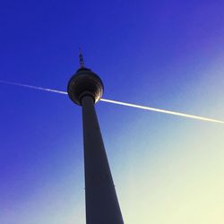 Low angle view of fernsehturm tower against clear sky