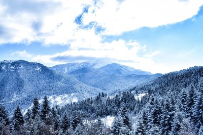 Scenic view of mountains against sky during winter