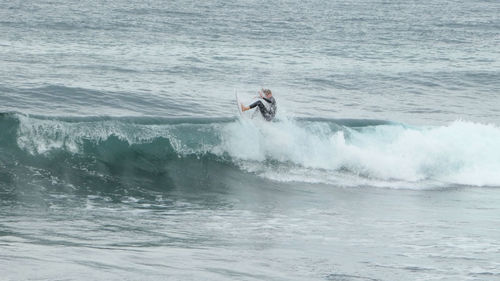 Man surfing in sea