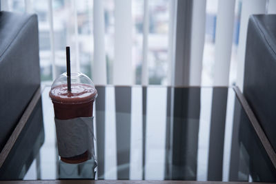 Close-up of drink on table at home