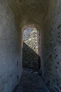 Old ruin seen through window