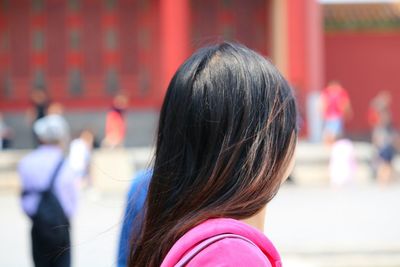 Rear view of woman on street