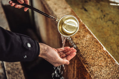 Man pouring water