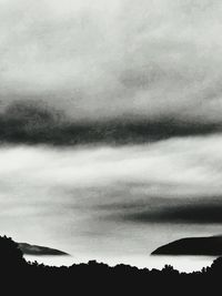 Scenic view of silhouette mountain against sky