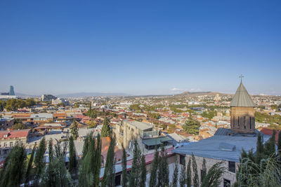 High angle view of townscape against sky in city