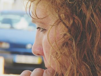 Close-up of thoughtful woman looking away