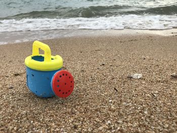 Toy on sand at beach