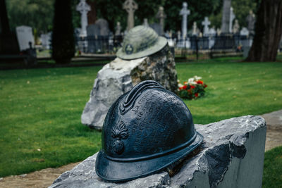 Closeup on irish infantry helmet, a memorial of fallen soldiers who fought in ww, glasnevin cemetery