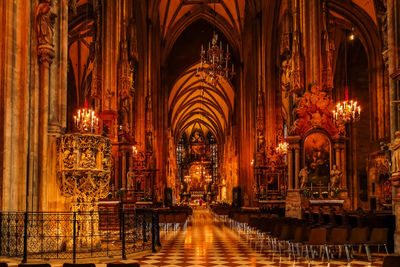 Illuminated corridor of church building cathedral in vienna 