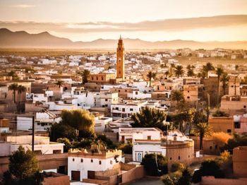 High angle view of townscape against sky during sunset