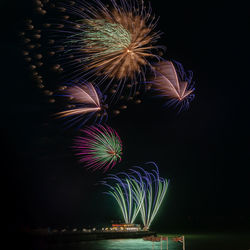 Firework display at night