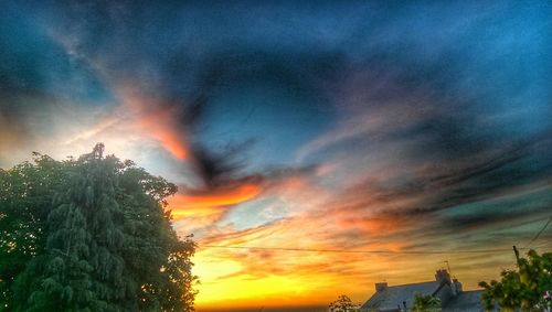 Scenic view of cloudy sky at sunset