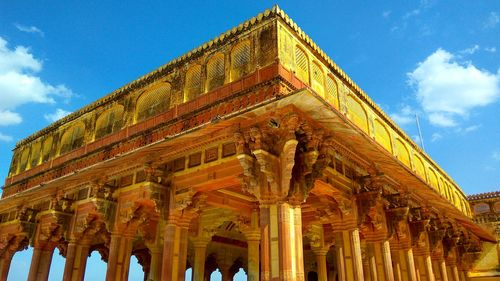 Low angle view of temple against blue sky