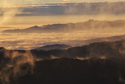 Scenic view of mountains against sky during sunset