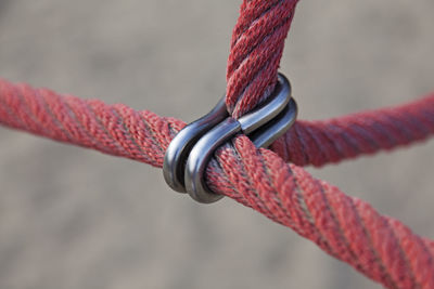 Close-up of rope tied on metal