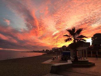 Scenic view of beach at sunset