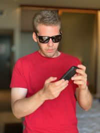 Young man using mobile phone