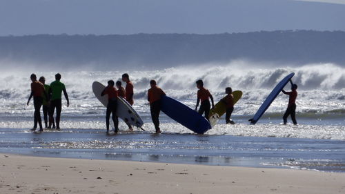 People enjoying at beach