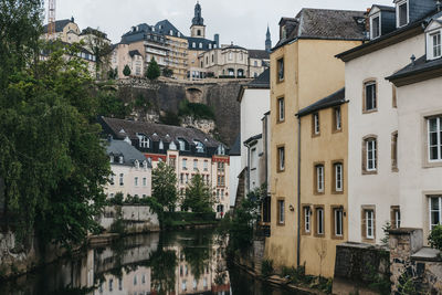 Houses on the bank of river alzette in luxembourg city, luxembourg.