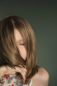 Close-up of girl with brown hair